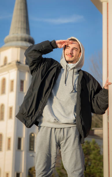 istock A young man looks at the sky 1476302269