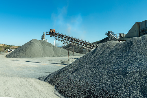 Conveyor belts in an aggregate quarry.