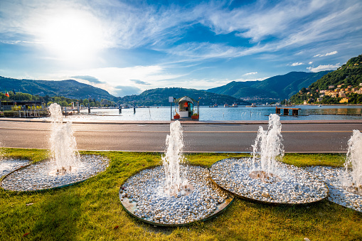 Town of Como waterfront fountains view, Lombardy region of Italy
