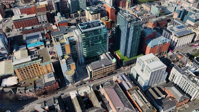Aerial video of Belfast City Hall Cityscape Skyline on a sunny day in Northern Ireland