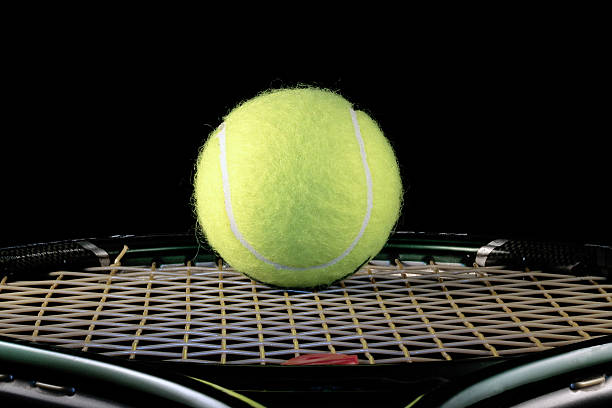 istock ball and tennis racket 147631082
