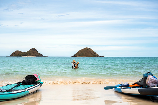 Paddleboarding at Lanikai Beach. Best honeymoon locations. Best beaches in Hawaii.