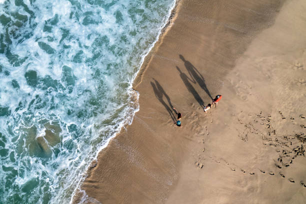 istock Family enjoying a beautiful beach vacation 1476341626