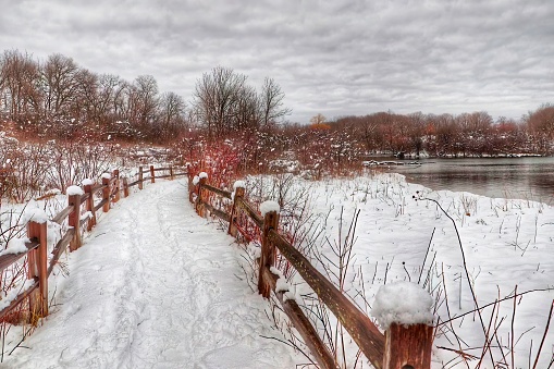 Snowy landscape with fence