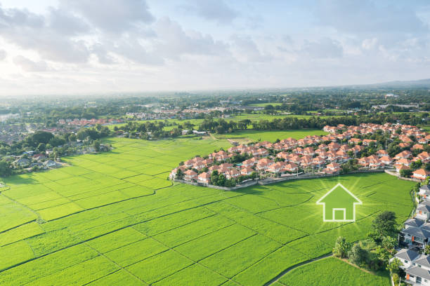istock Green fields and dream house in aerial view. 1476361570