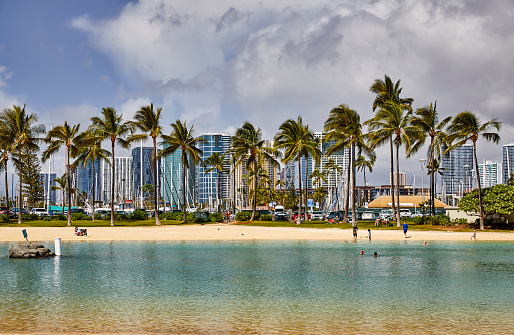 Waikiki, Oahu, Hawaii, USA, - February 13, 2023: Lagoon and Beach at the Hilton Hawaiian Village