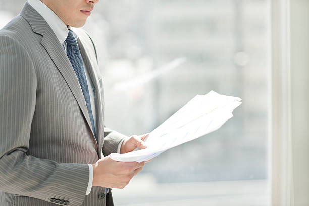 istock The businessman who confirms a document 147638054