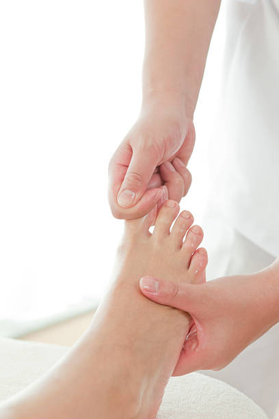 istock The beautician who massages a foot 147638692