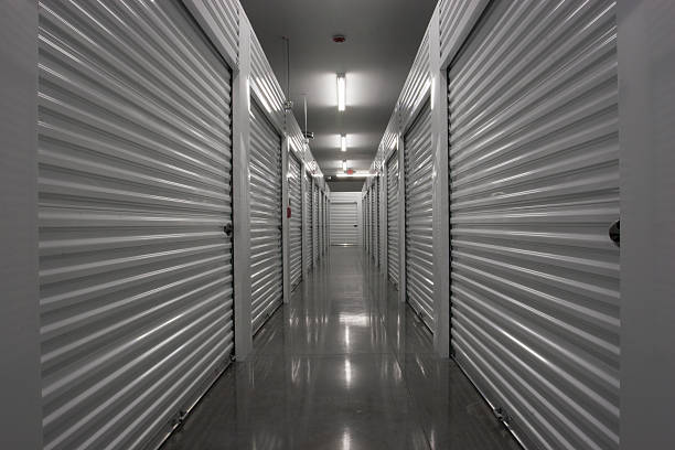 Self Storage Units Hallway of a self storage unit. storage compartment stock pictures, royalty-free photos & images