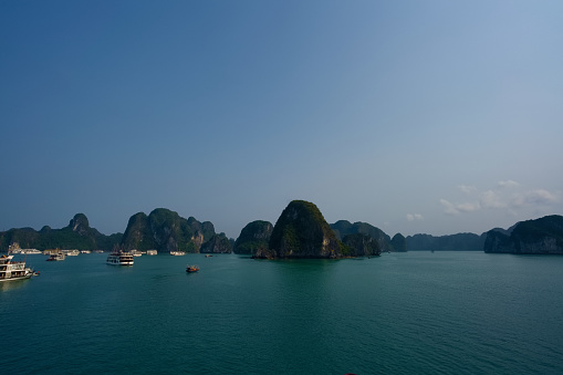 Halong Bay is one of World Natural Heritage where are many unique shape islands and beautiful sea water.