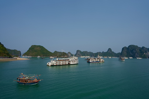 Halong Bay is one of World Natural Heritage where are many unique shape islands and beautiful sea water.