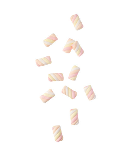 istock Falling Marshmallow rainbow twist isolated on white background with clipping path 1476423687