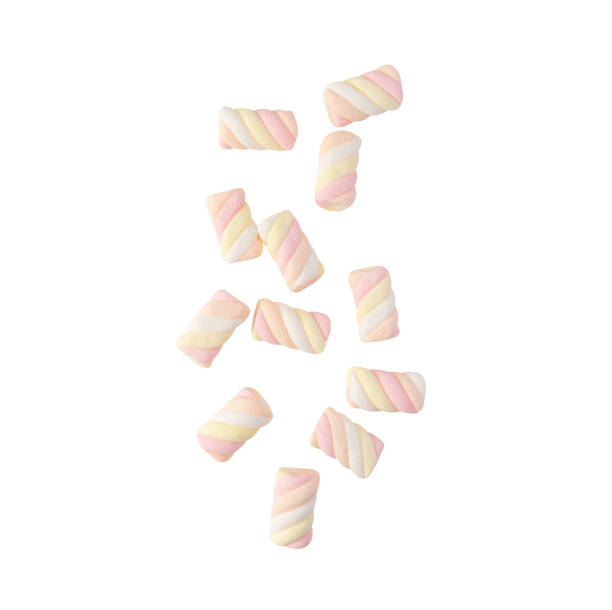 istock Falling Marshmallow rainbow twist isolated on white background with clipping path 1476423694