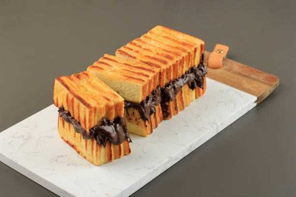 istock Roti Bakar or Toast Bread, Indonesian Street Snack Made from Multi Layer Bread with Butter 1476427586