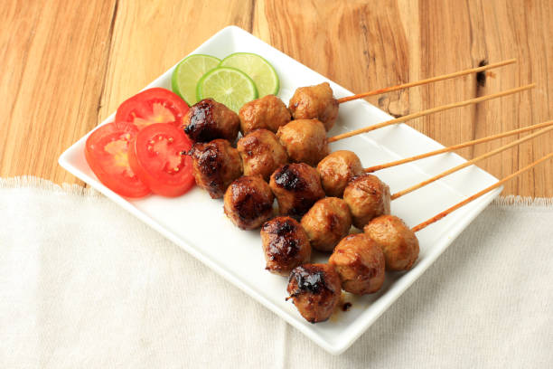 istock Bakso Bakar, Grilled Meatball Served with Skewer. 1476427664