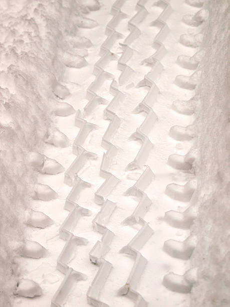 istock Tire Tread In Fresh Snow 147643227