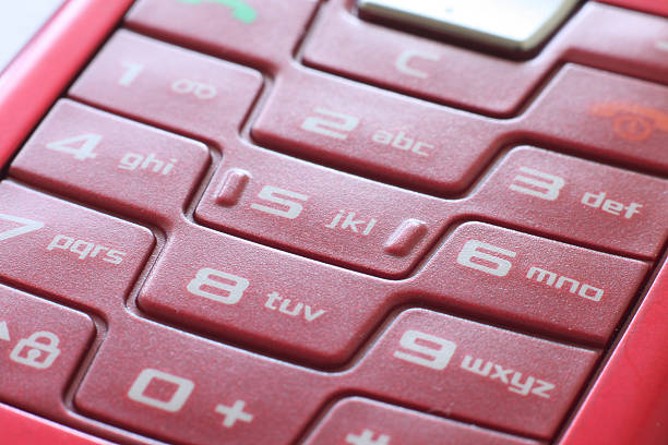 Red mobilephone close up stock photo