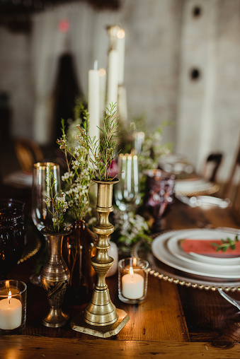 Side angle view of a table set up for a dinner party