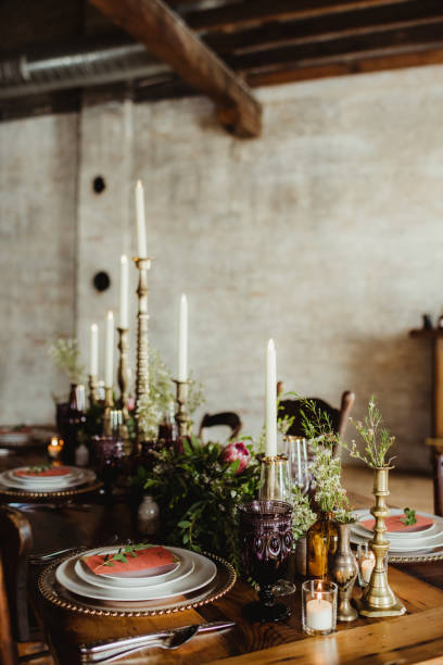 istock Angle view of a table set up for an indoor wedding dinner 1476435429