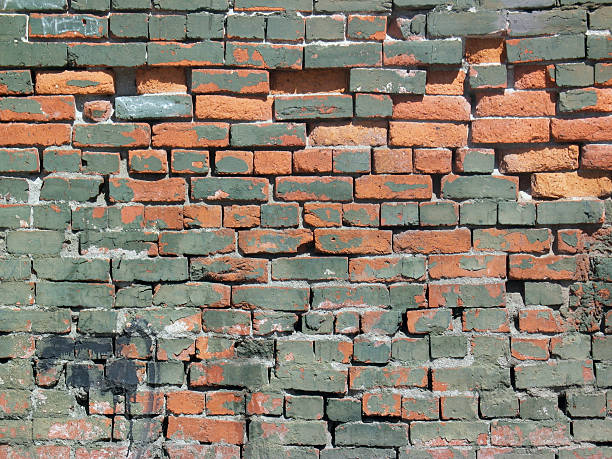 Pintura de pared de ladrillos muestra desgaste - foto de stock