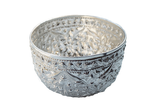Silver bowl isolated on white background, no shadow. The silver bowl is used for containing water to drink. Use for Songkran festival  to pour water on the hands of revered elders and ask for the blessing