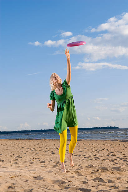 istock Girl playing frisbee 147644569