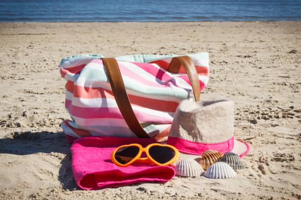 istock Accessories using for relax on beach. Travel and vacation time 1476455149