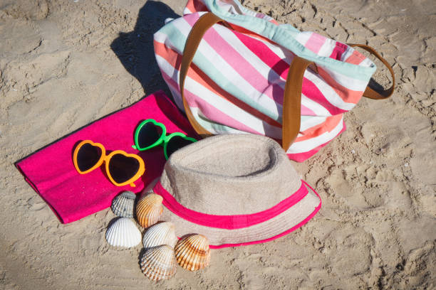 istock Colorful accessories using for relax and sunbathing on beach. Travel and vacation time 1476455203
