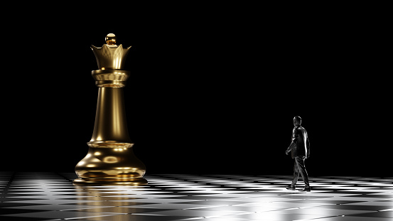 Black figure of a businessman walking to the golden queen chess piece at chessboard board.