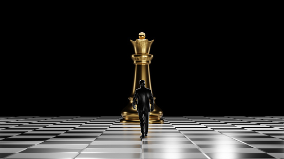 Black glossy figure of a businessman walking to the golden queen chess piece at chessboard board. Leadership, business strategy, career, the way forward concepts