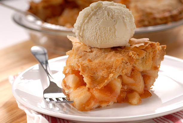 Slice of deep dish apple pie with vanilla ice cream Freshly baked deep dish apple pie a la mode apple pie photos stock pictures, royalty-free photos & images