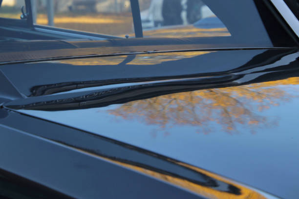 istock Reflection of a autumn tree on vintage car 1476468536