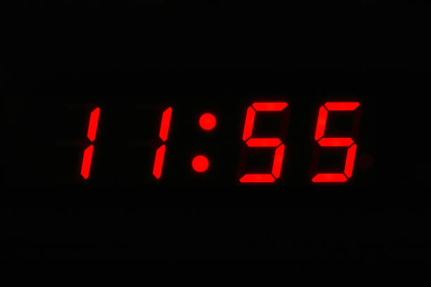 Almost Twelve O'clock Almost Twelve O'clock - digital clock displaying 11 55 its almost time stock pictures, royalty-free photos & images