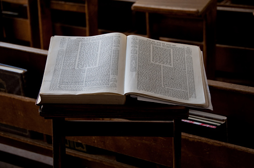 Open Holy Bible on  table