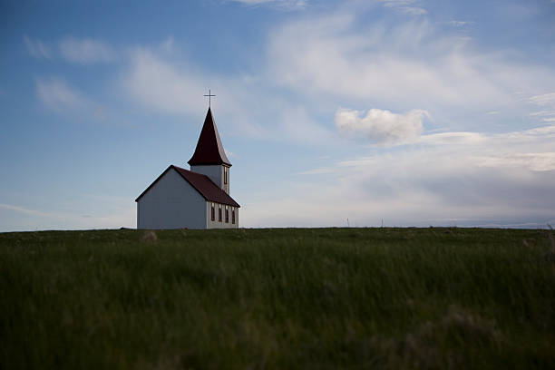 istock Church in grassy field 147647861