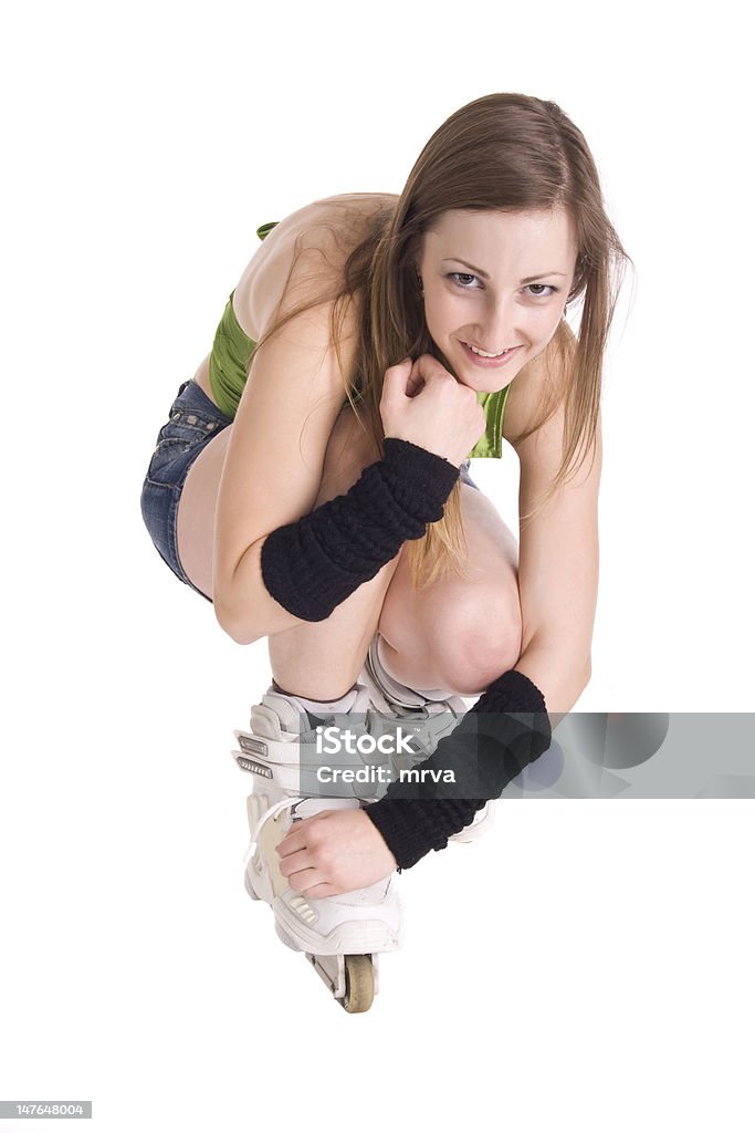 Bastante joven mujer con patines de ruedas - Foto de stock de Patín en línea libre de derechos