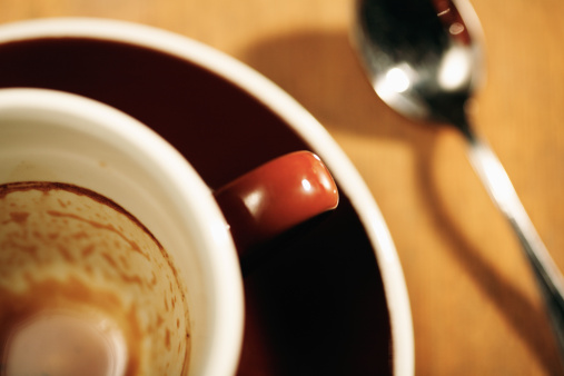 Finished cup of coffee selective focus