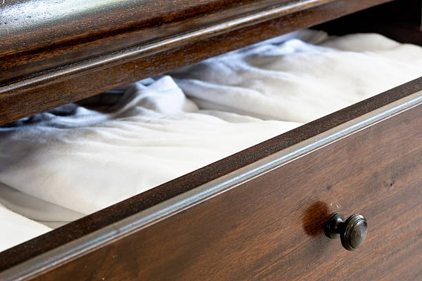 istock open dresser drawer with white clothing 147648271