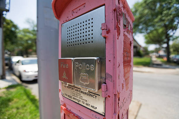 Red fire alarm box located close to Brooklyn bridge