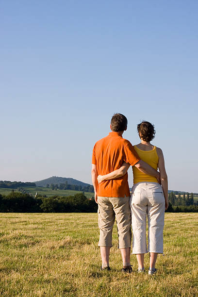 istock Couple in a meadow 147648788