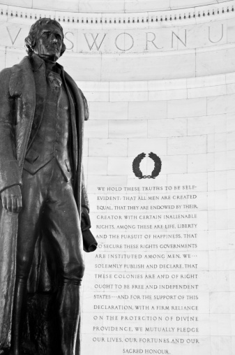 picture of the founding father's statue located in Washington D.C. including an inscription at the Jefferson Memorial.