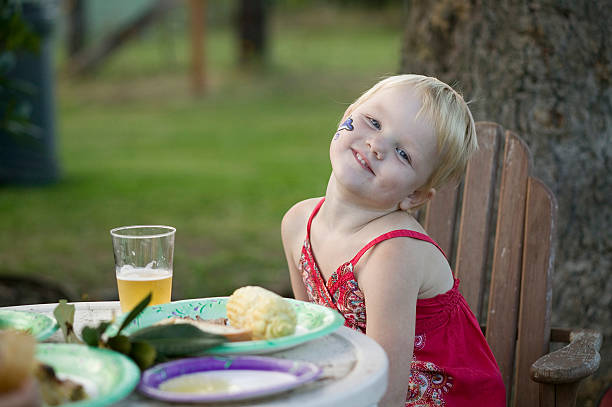 Child at a birthday party stock photo