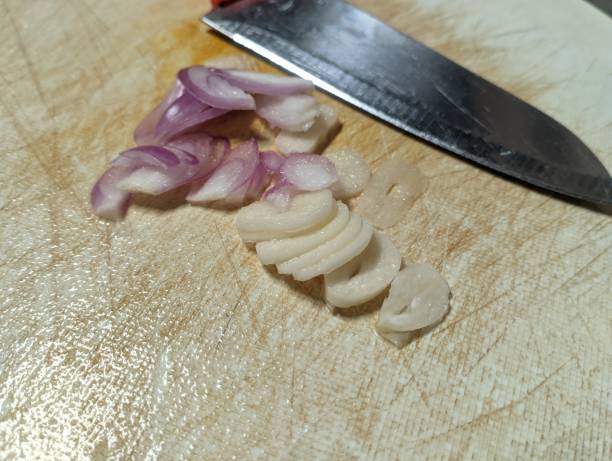 istock chopped onions on a white cutting board 1476499998