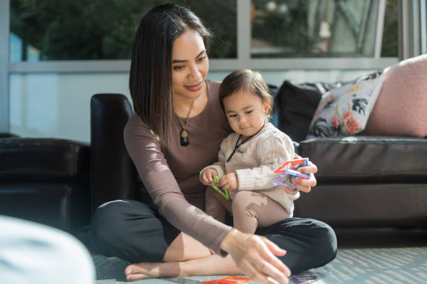 Bonding time, mother and daughter playing