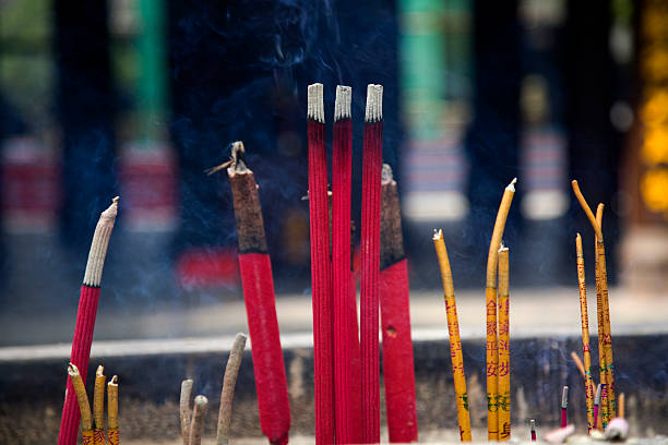 istock Smoking Incense Sticks Baoguang Si Buddhist Temple Sichuan China 147651322