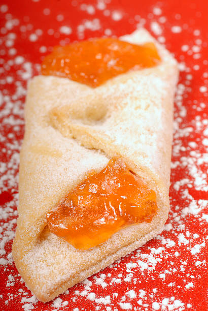 Kolache with apricot filling Freshly baked Kilache with apricot filling kolache stock pictures, royalty-free photos & images