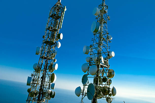 telecommunications towers stock photo