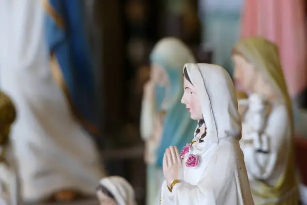 Photo of Closeup of the statue of Virgin Mary praying