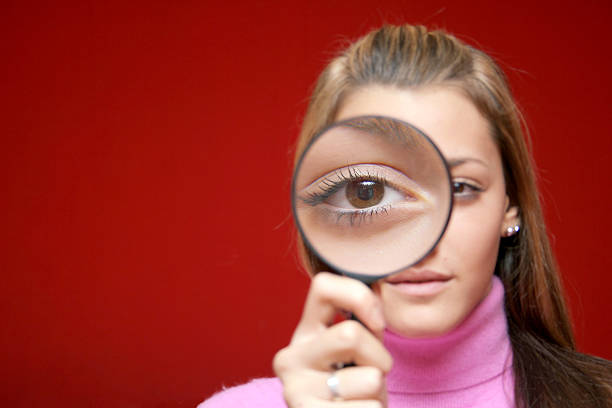 istock Girl and lens 147653072