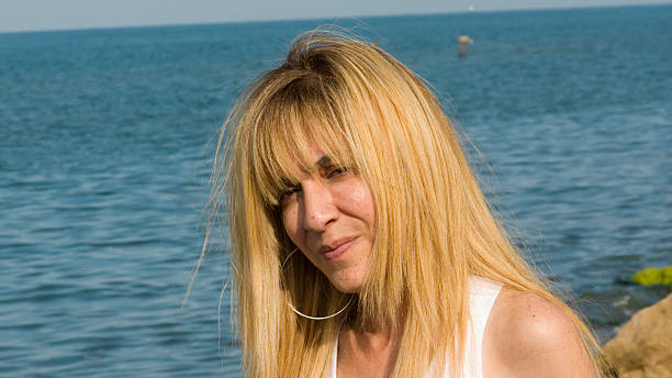 istock Woman at the shore 147653161